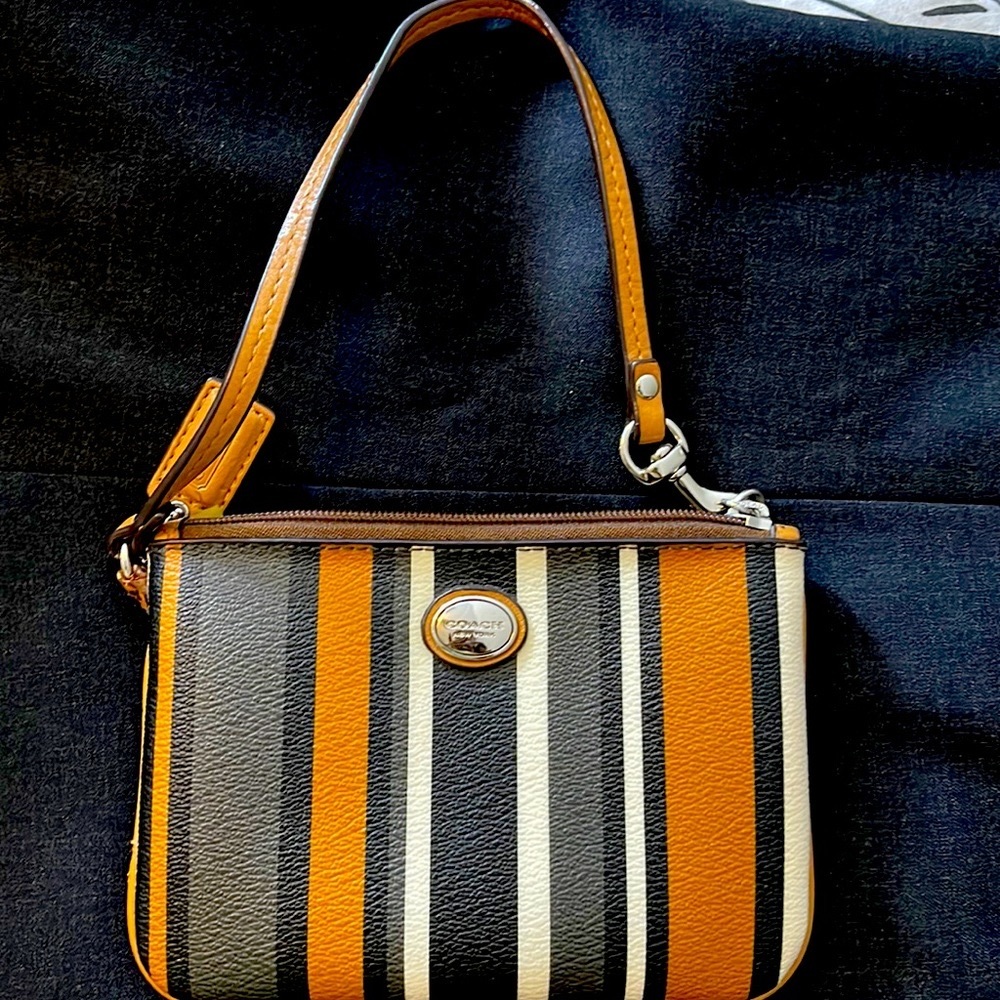 Coach wristlet in stripes